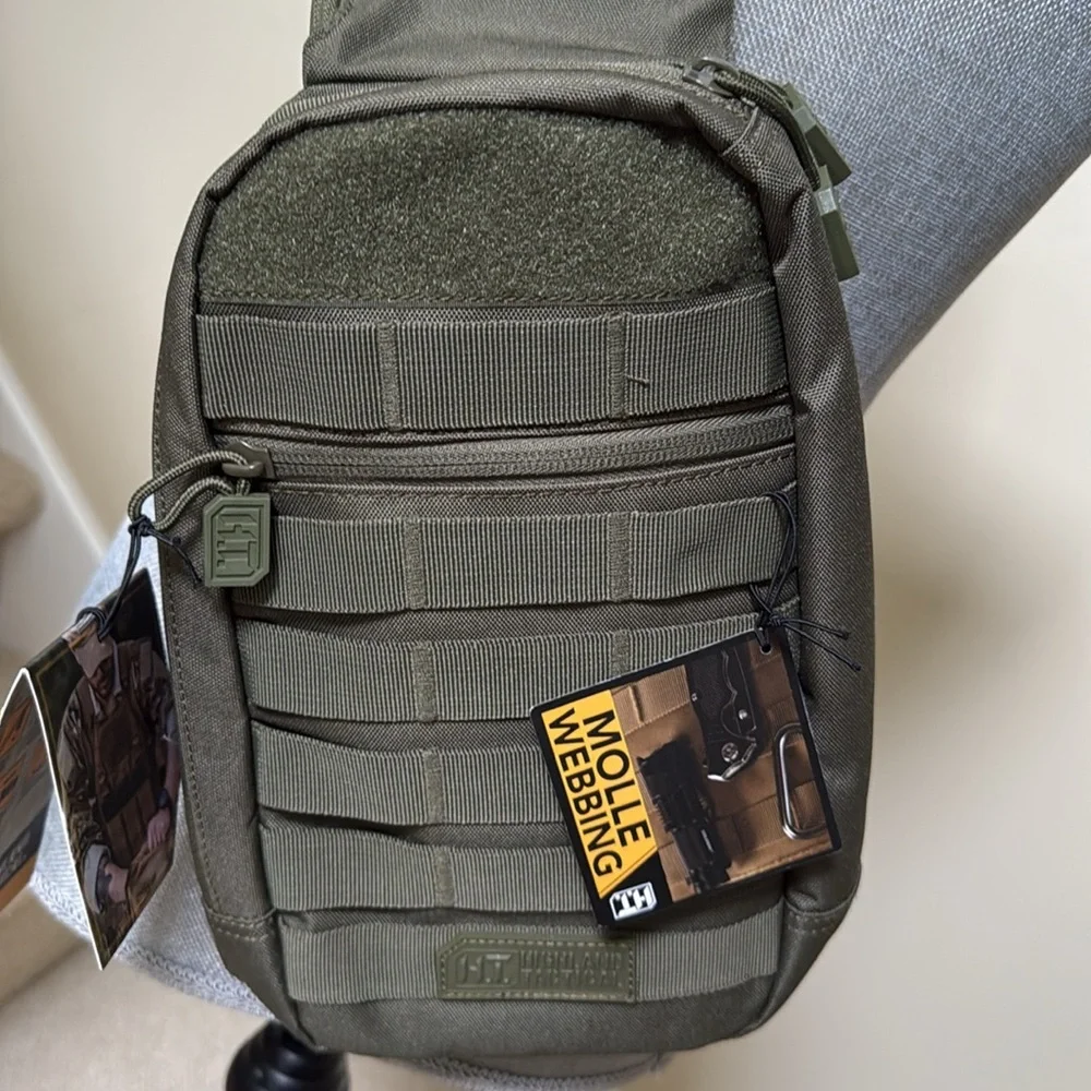 Tactical Sling Bag - Olive Green. Multiple pockets. Spacious compartments.